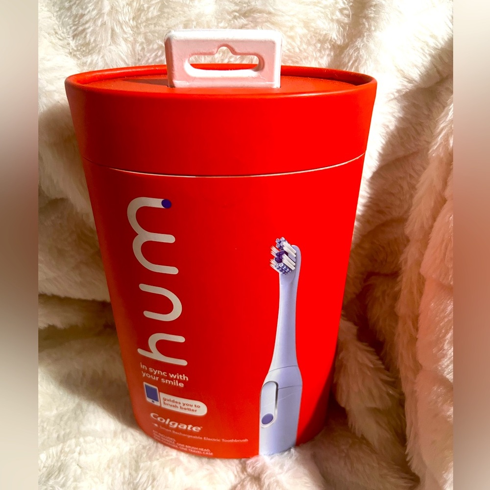 NWT HUM Electric Toothbrush. Never opened. Nice!